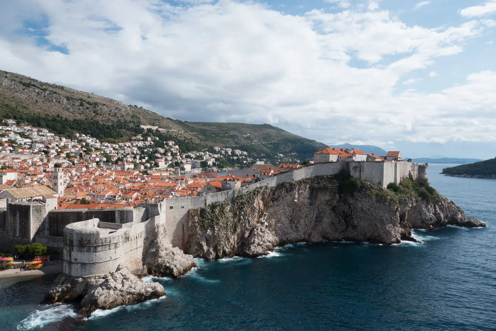 The walled old town above the sea, seen from the cliffs.