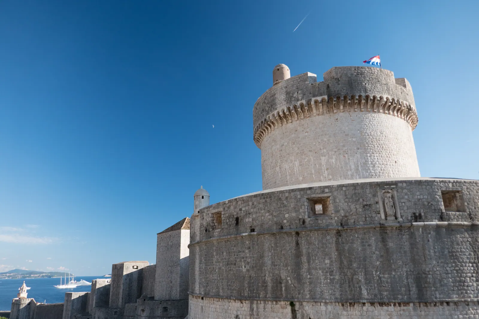 A round stone fortress tower on the city walls.